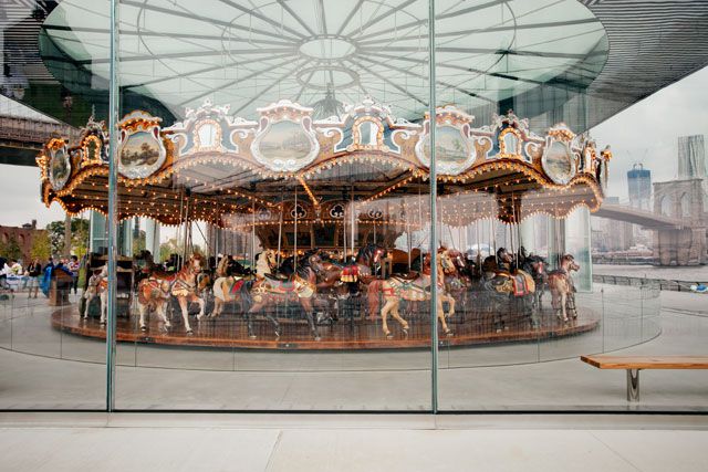 Looking at the Carousel, you can see the Brooklyn Bridge in the background.